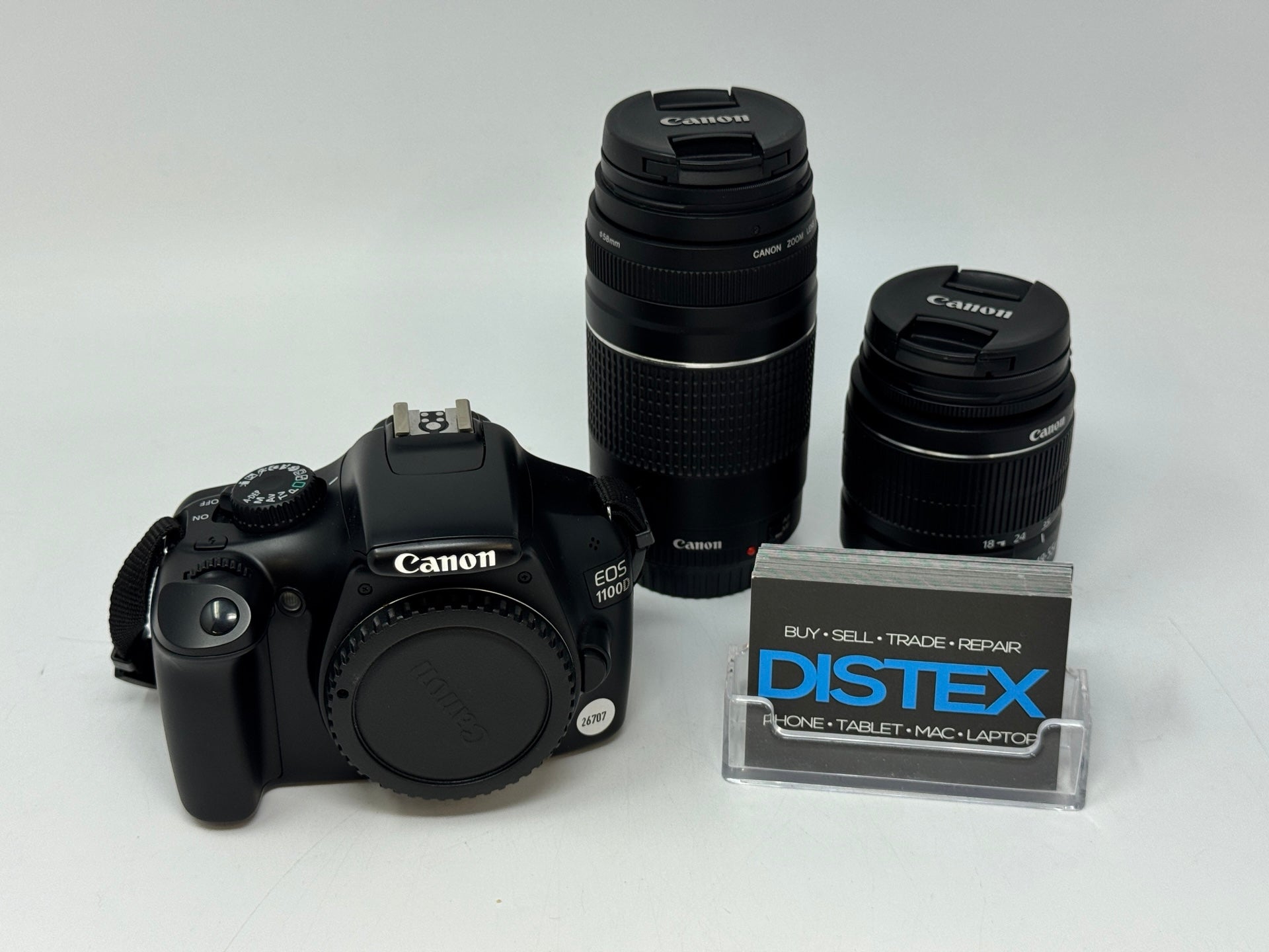 Canon EOS 1100D Digital SLR Camera w/ 18-55 mm f/3.5-5.6 DC and 75-300mm f/1.4-5.6 Lens M24388 (B) M26707
